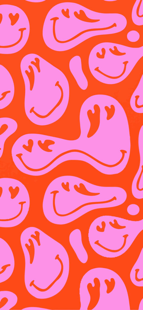 An image of a colorful pattern with pink smiley faces and abstract shapes on an orange background. 