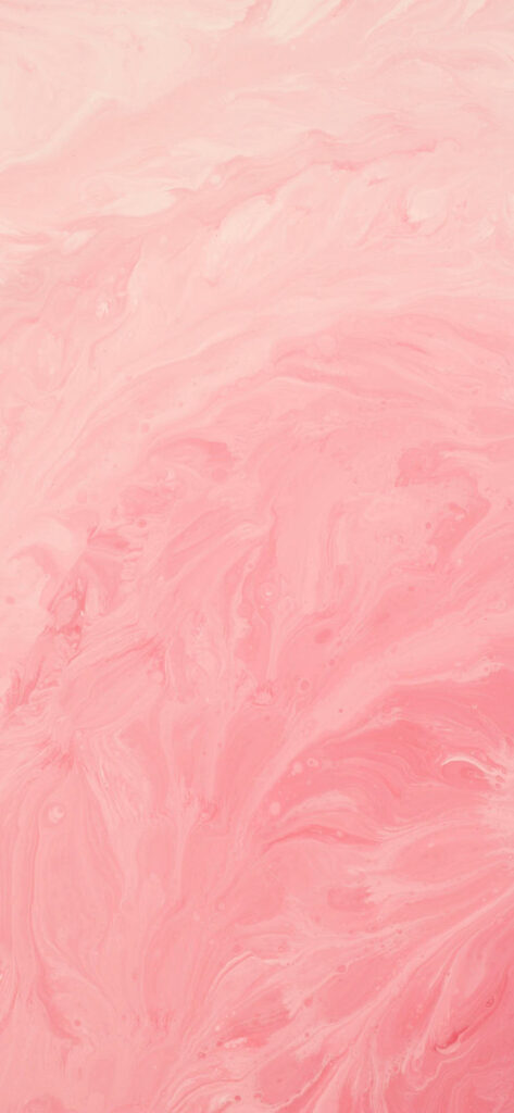 A close-up of a pink marbled texture with swirling patterns. Free Valentines Aesthetic Wallpapers.

